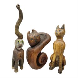 Helen Skelton (British 1933 – 2023): Three carved wooden abstract sculptures, each modelled as a cat, with carved or painted features, largest H63cm. Born into an RAF family in 1933 in Kent and travelled the world extensively during her childhood. After settling in Bridlington, Helen immersed herself in painting, textiles, and wood sculpture, often inspired by nature's beauty. Her talent was showcased in a one-woman show at Sewerby Hall and recognised with the sculpture prize at Ferens Art Gallery in 2000. Sadly, Helen’s daughter passed away from cancer in 2005. This loss inspired Helen to donate her sculptures to Marie Curie upon her passing in 2023.