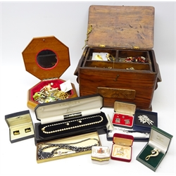 Collection of costume jewellery including brooches, necklaces, wristwatch, cuff links etc, porcelain trinket box, miniature quartz brass clock etc with two wooden jewellery boxes