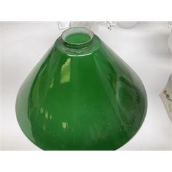 Milk glass lampshade decorated with peacocks, together with a Tiffany style lampshade, a set of five white frilled lamps shades etc 