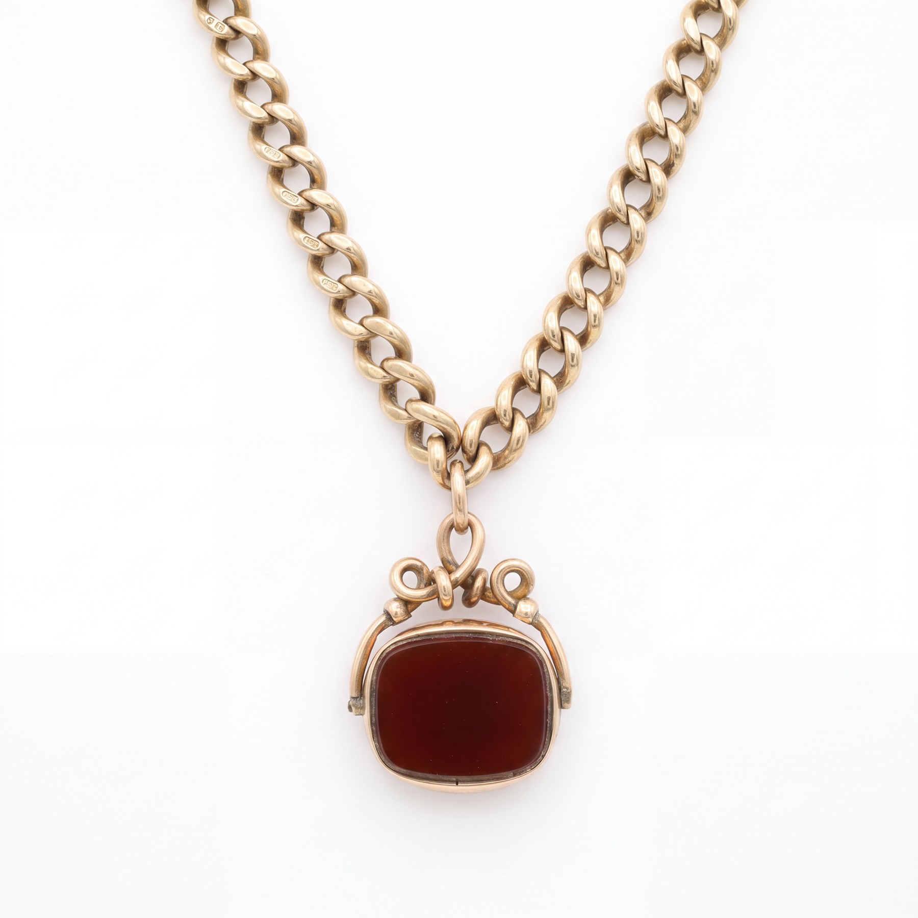 19th / early 20th century 9ct rose gold graduating Albert / necklace chain, stamped 9 375, suspending a 9ct gold bloodstone and agate swivel fob, Birmingham 1892