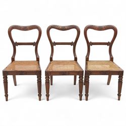 Gillows - Set of six mahogany dining chairs, each with curved top rail carved with floral medallion and scroll detail, fluted front supports, caned seats, the seat rail underside stamped HH identified as H. Howse an apprentice cabinetmaker at Gillows.