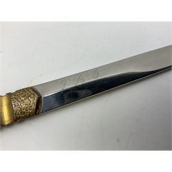 Malayan Kris dagger, the 31.5cm double edged straight heavy damascus blade with copper ferrule; carved hardwood grip; in large wooden throated scabbard with floral decorated white metal covering L47.5cm overall; a kris blade with adapted antler grip; and five various small daggers/letter openers (7)
