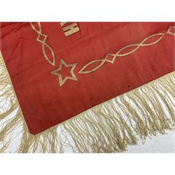 1970s Soviet banner printed in gold on a red ground, roughly translates as 'Transferable Banner - To the winner in the Socialist Competition' and 'Work Study Live by Communism' verso; wreath of wheat ears to either side; tassels on three sides 110 x 155cm