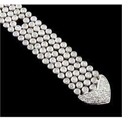 14ct white round brilliant cut diamond belt bracelet, the bracelet with rubover set diamonds, the buckle and clasp with pave set diamonds, stamped 14K, total diamond weight 5.35 carat