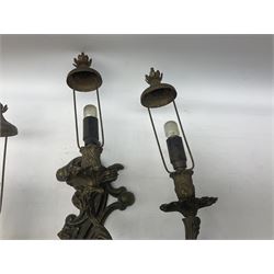 Cast metal wall sconce with three curved foliate branches, detailed with putto, H68cm