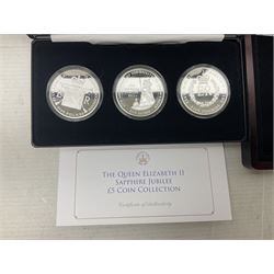 Mostly commemorative coins including The Royal Mint 1997 proof coin collection, Westminster 2013 'The Royal Baby Photographic 65mm' coin, Jubilee Mint 2017 'The Queen Elizabeth II Sapphire Jubilee' five pound coin collection etc