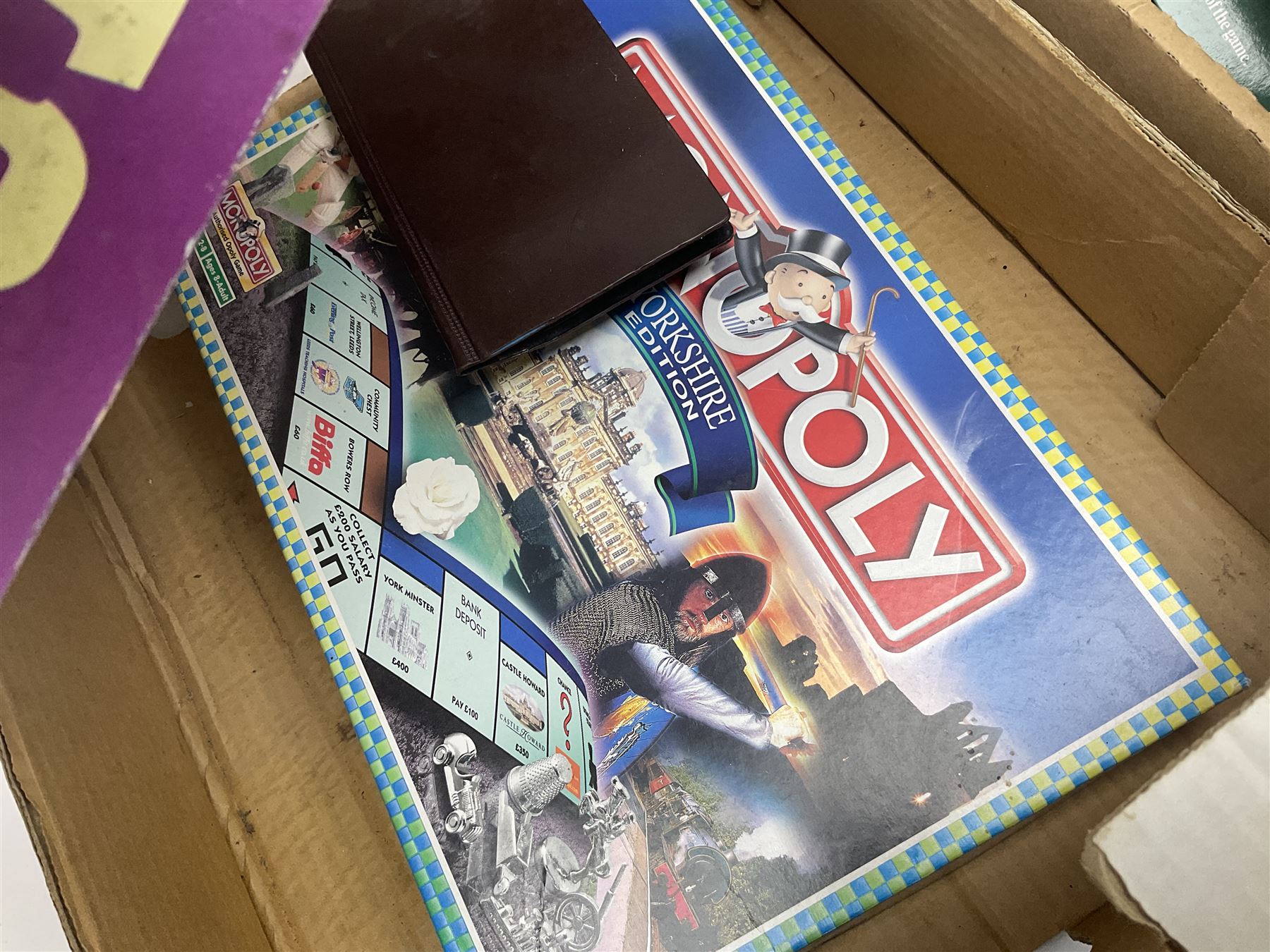 Selcol Beatles New Sound toy guitar, Triang baby walker, Mamod steam engine, wooden Noahs Ark toy, quantity of diecast cars and plastic soldiers and a collection of other toys and board games, in five boxes