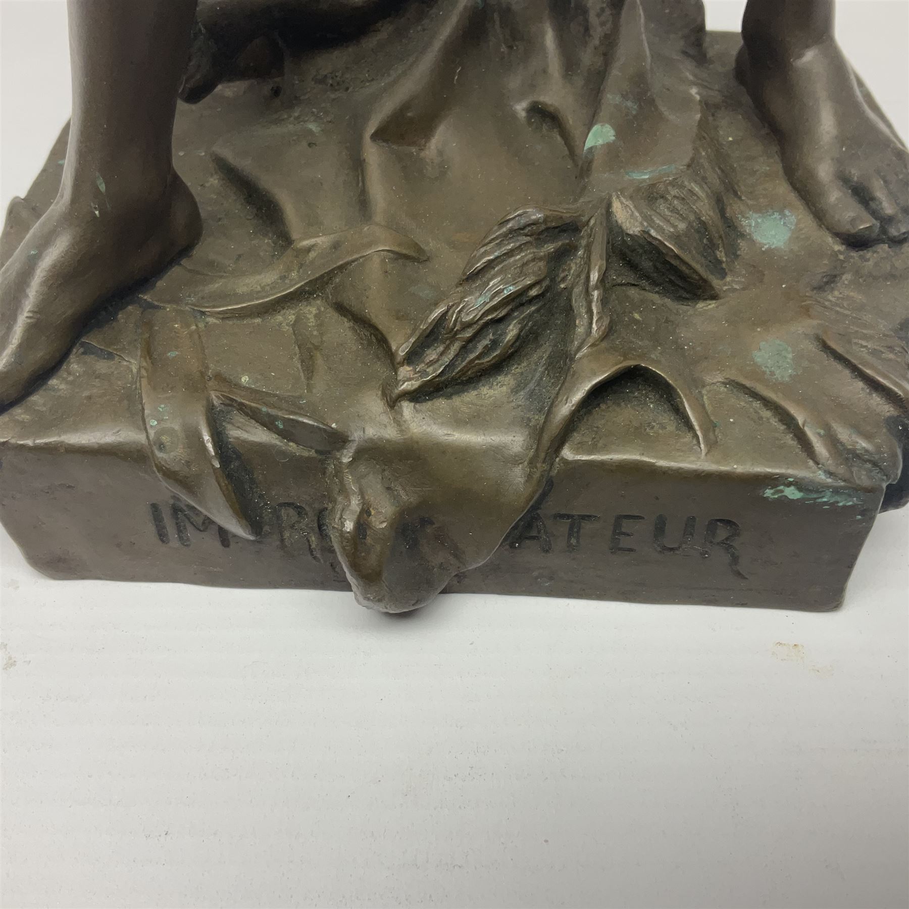 After Felix Carpentier, Improvisateur; bronzed figure of a man playing the flute, marked Felix Charpentier, H35