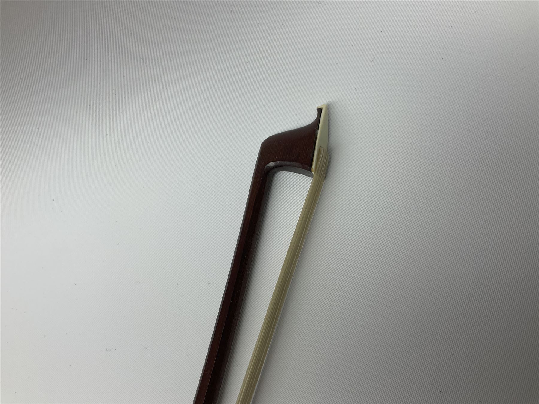 German Saxony violin c1900 with 35.5cm two-piece medium grain maple back and ribs and medium grain spruce top; bears label 'Jacobus Stainer in Absam prope Oenipontum 17xx Made in Germany', 59.5cm overall; with modern bow (2)