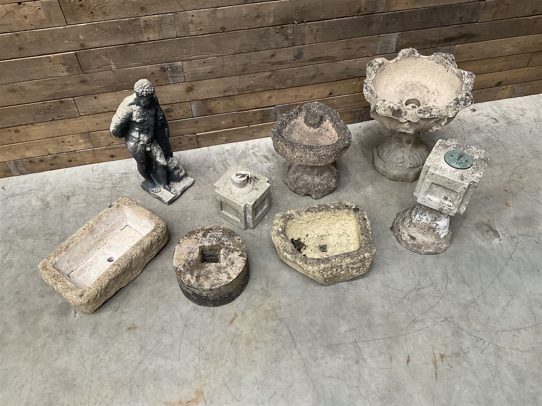 Collection of 9 decorative stone garden objects including sun dial small troughs mill stone and more,