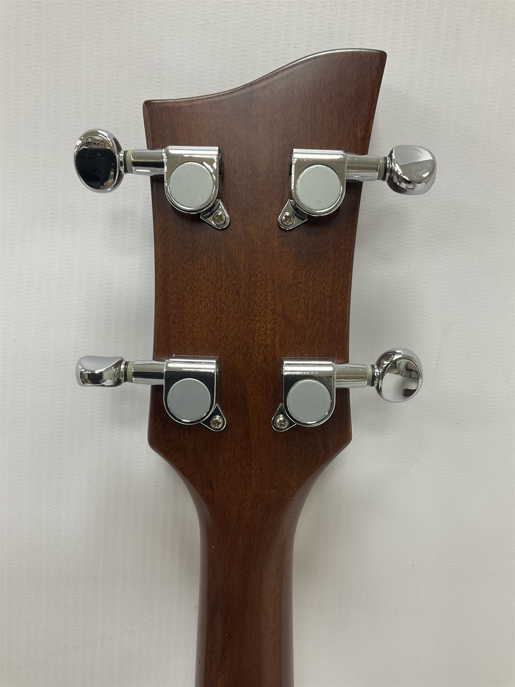 Ozark 'The Ozark Professional' tenor guitar, model no 3372, headstock stamped Ozark and with paper label to interior, in manufacturers hard case, guitar L82cm