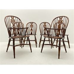 Set of six 20th century distressed elm Windsor chairs, comprising two carvers and four side chairs
