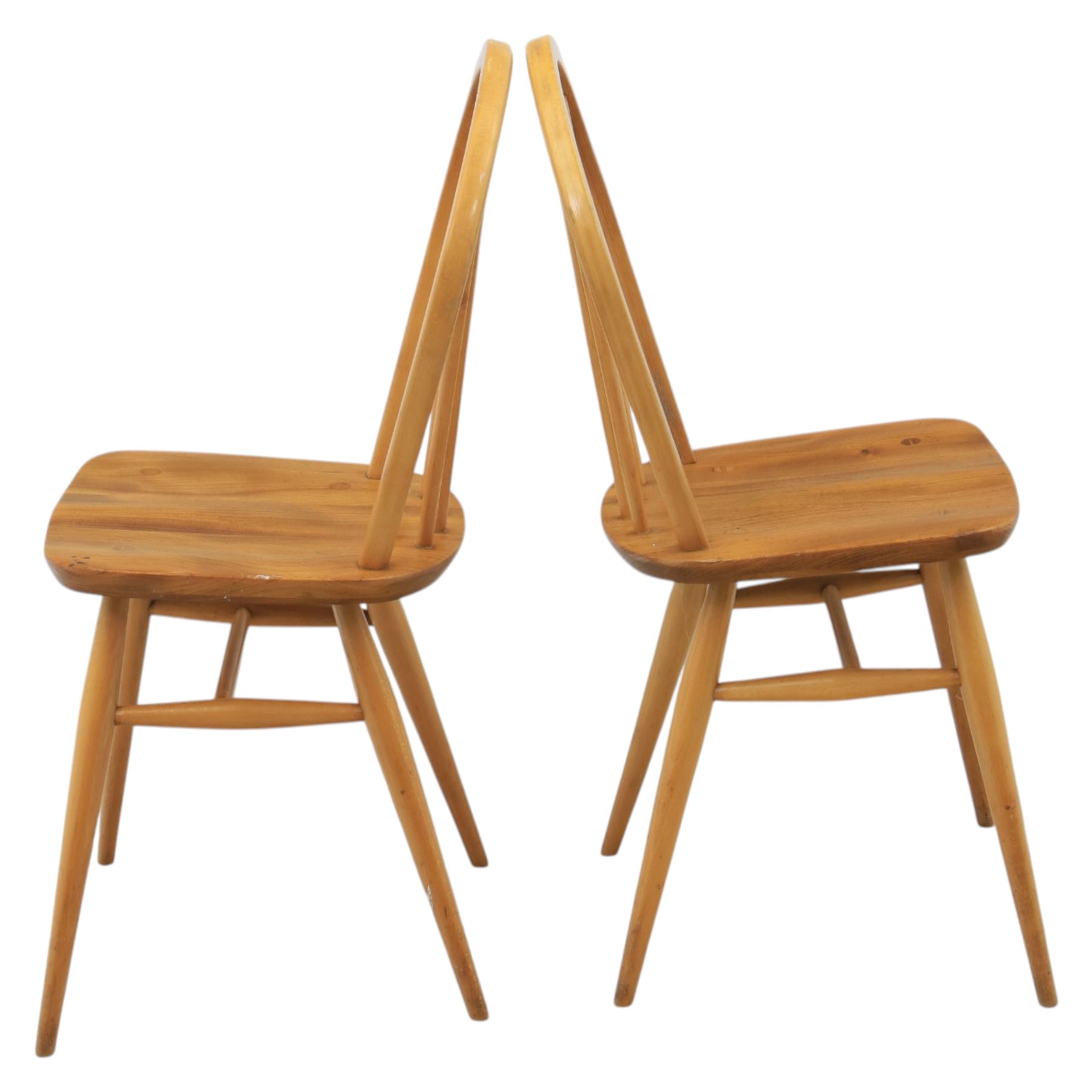 Ercol - set of four 'Windsor' waxed elm chairs, with hoop back design, on tapering supports