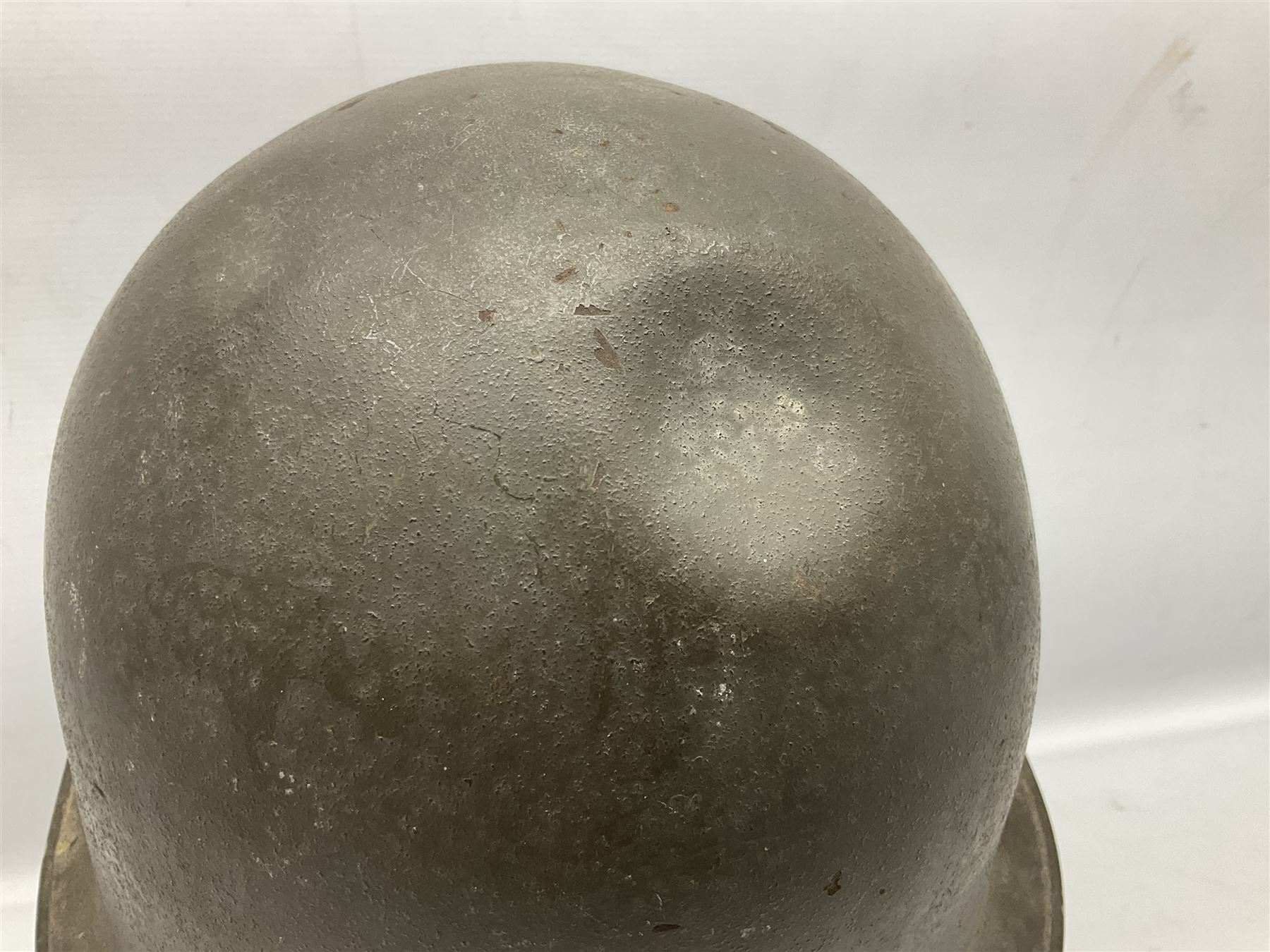 French Algerian War Red Cross steel helmet, marked 'CP ICA Esperaza 1955'; green finish with crudely painted Red Cross logo to the front