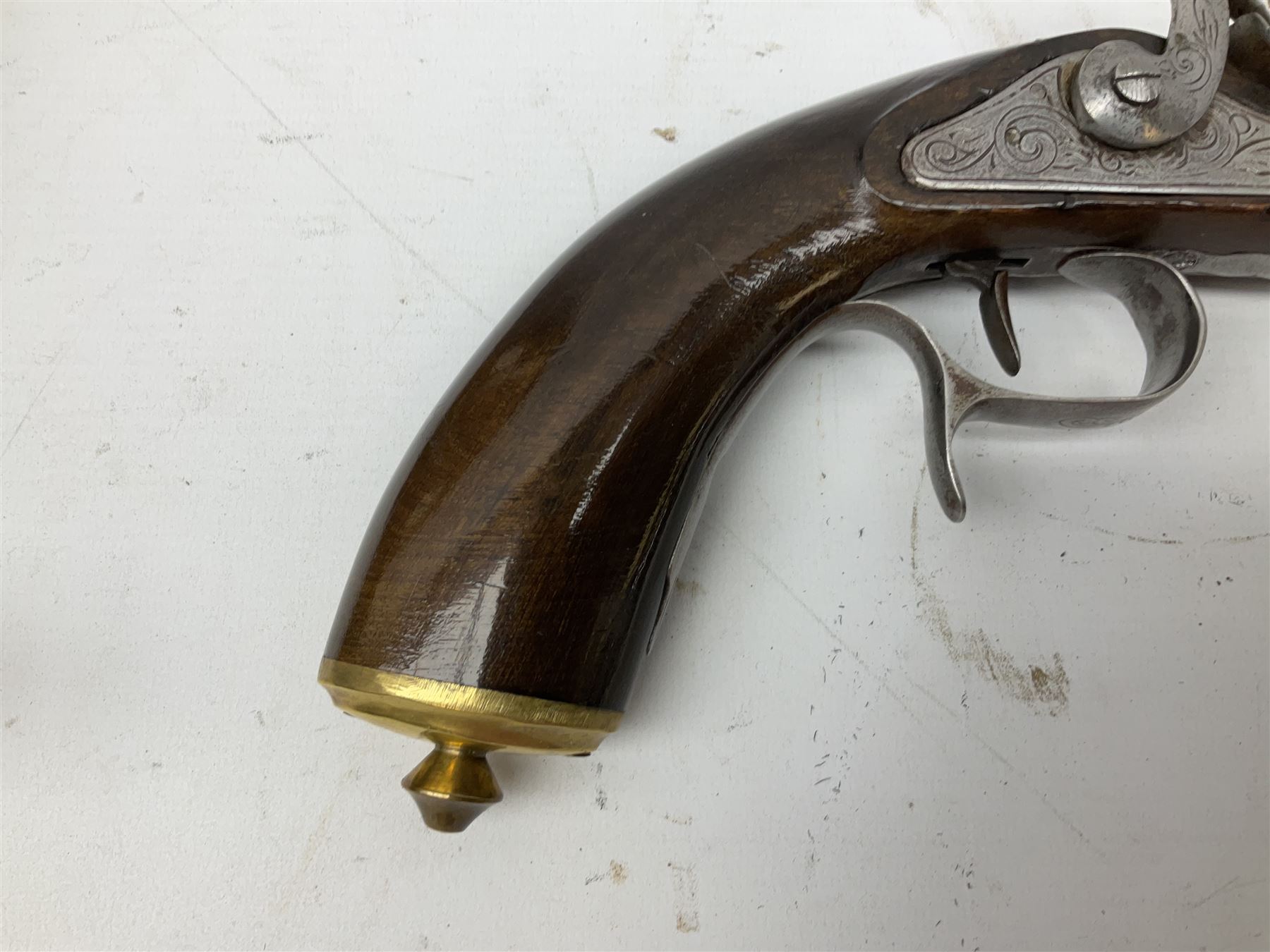 SECTION 1 FIREARMS CERTIFICATE REQUIRED OR REGISTERED FIREARMS DEALER - Pair of Reproduction Continental .44 calibre percussion target pistols, each with heavy 23.5cm octagonal to round barrel bearing various marks, crude scroll engraving to lock plate, hammer and octagonal section of barrel, unchequered walnut stock with brass butt plate and steel hooked trigger guard, numbered 8138 & 8164, L41.5cm overall; in maroon baize lined converted sapele mahogany fitted case bearing reproduction trade label for Trulock & Son Dublin containing small copper powder flask, steel scissor action bullet mould, nipple key, turned wooden mallet and lidded box, steel rammer and wooden cleaning rod, case L48cm