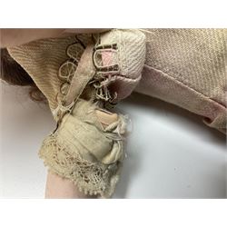 Victorian wax shoulder head doll with applied hair, inset glass eyes and jointed body with composition lower limbs; faded pink dress H35cm