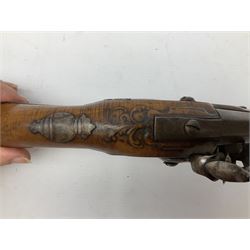 Continental flintlock pistol, probably 19th century, approximately twenty bore, the full walnut stock with brass and steel mounts, lock inscribed 'In Brischia Scioli', skull crusher butt L56cm