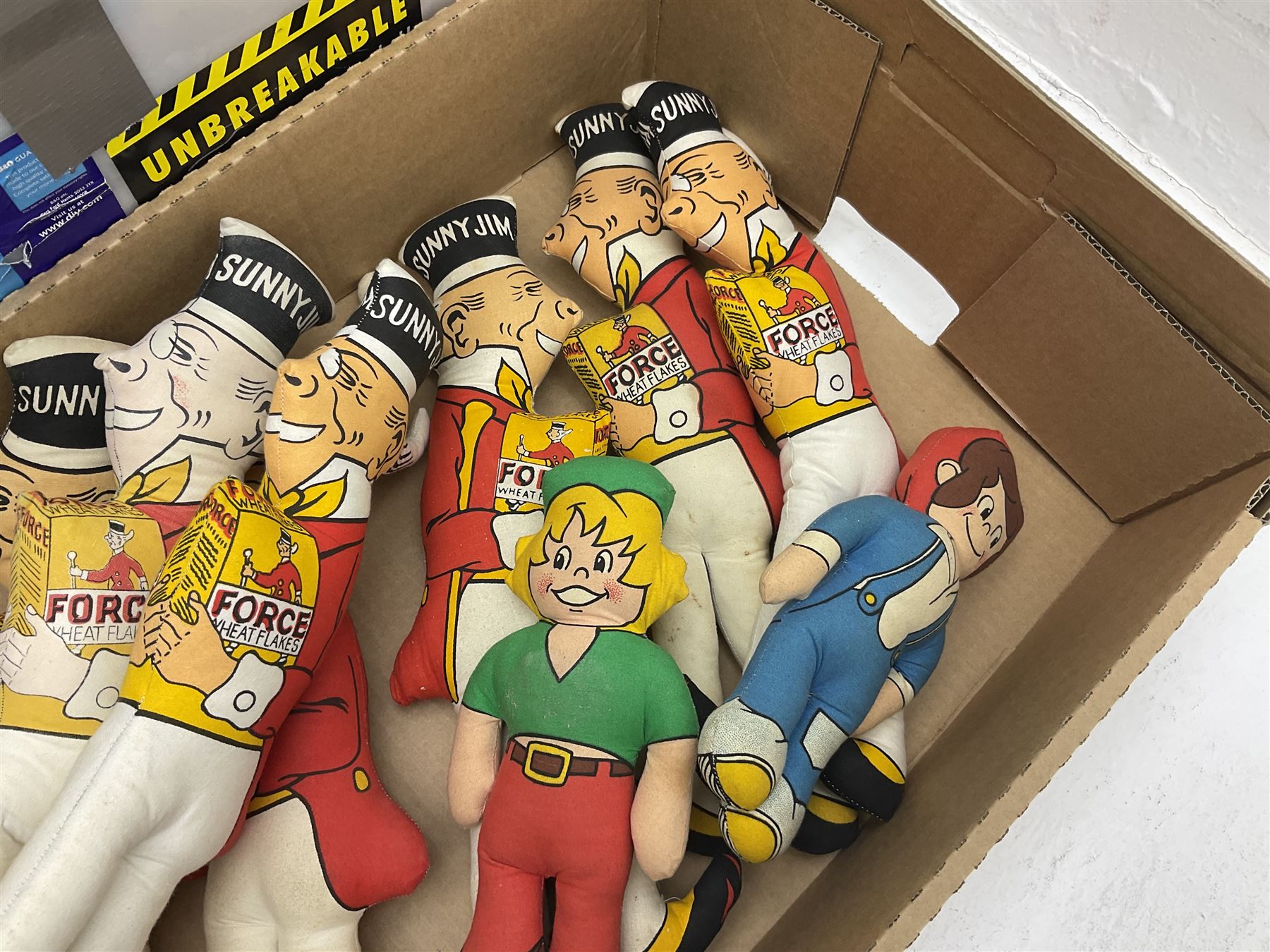 Quantity of Sunny Jim advertising soft toys, together with a quantity of Mcdonalds toys in two boxes