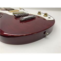 Gibson Marauder style six-string electric guitar with cherry coloured body, marked made in Japan L101cm; in locking hard carrying case