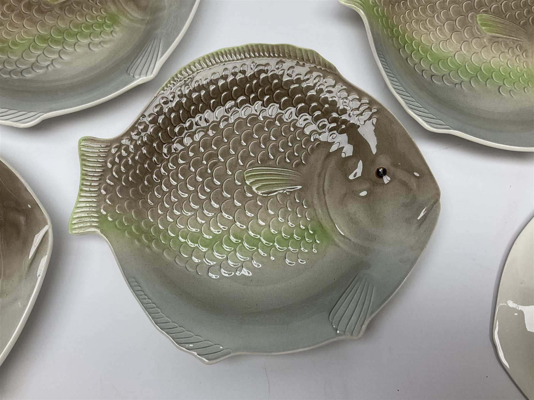 Shorter & Son six fish plates, together with a larger platter and sauce boat and saucer, all with stamped marks beneath