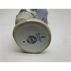 Six Lladro figures, comprising Naughty Dog no 4982, Best Friend 7620 and My Buddy no 7609, Kitty Confrontation no 1442, It Wasn't Me no 7672 and Rabbit Eating no 4772, three with original boxes, largest example H22cm