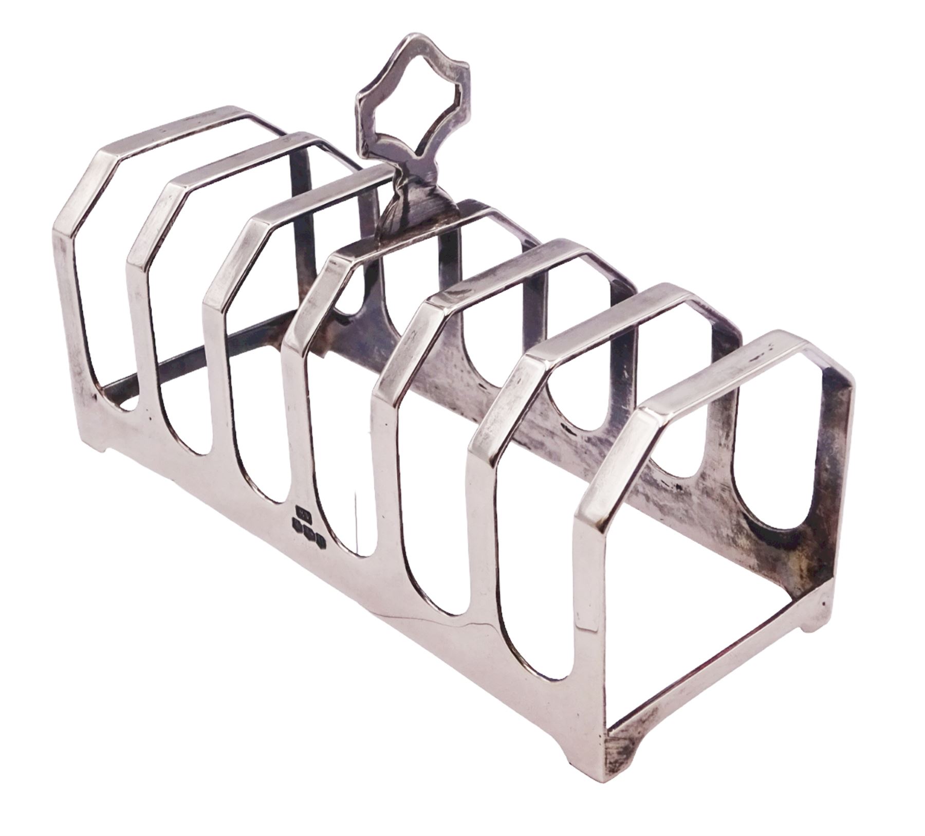 1930's silver seven bar toast rack, with angular canted bars and central shaped handle, hallmarked Viner's Ltd, Sheffield 1937, including handle H7cm, approximate weight 2.35 ozt (73 grams)
