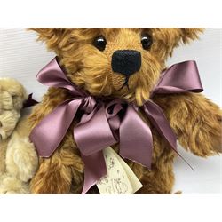 Group of five teddy bears comprising ‘George’ a unique pellet filled bear with glass eyes and velvet paws H38cm, and ‘Abbey’ a luxury German plush with wobble head and glass eyes no.5/10 H24cm, both with Teddies from Bearyland labels; along with two light blonde mohair H. M. Bears and Boyds Bears ‘T. F. Wuzzies’ no. 595140 (5)