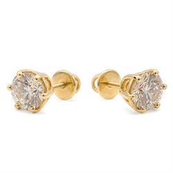 Pair of 18ct gold diamond earrings, each screw back stud set with a single round brilliant cut diamond, total diamond weight approx 3.15 carat