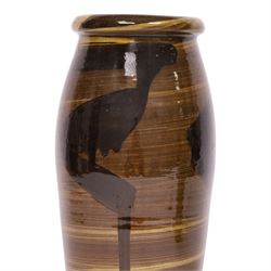 Studio pottery vase by Menston Art Pottery, decorated with brown and green slipware design, H39cm