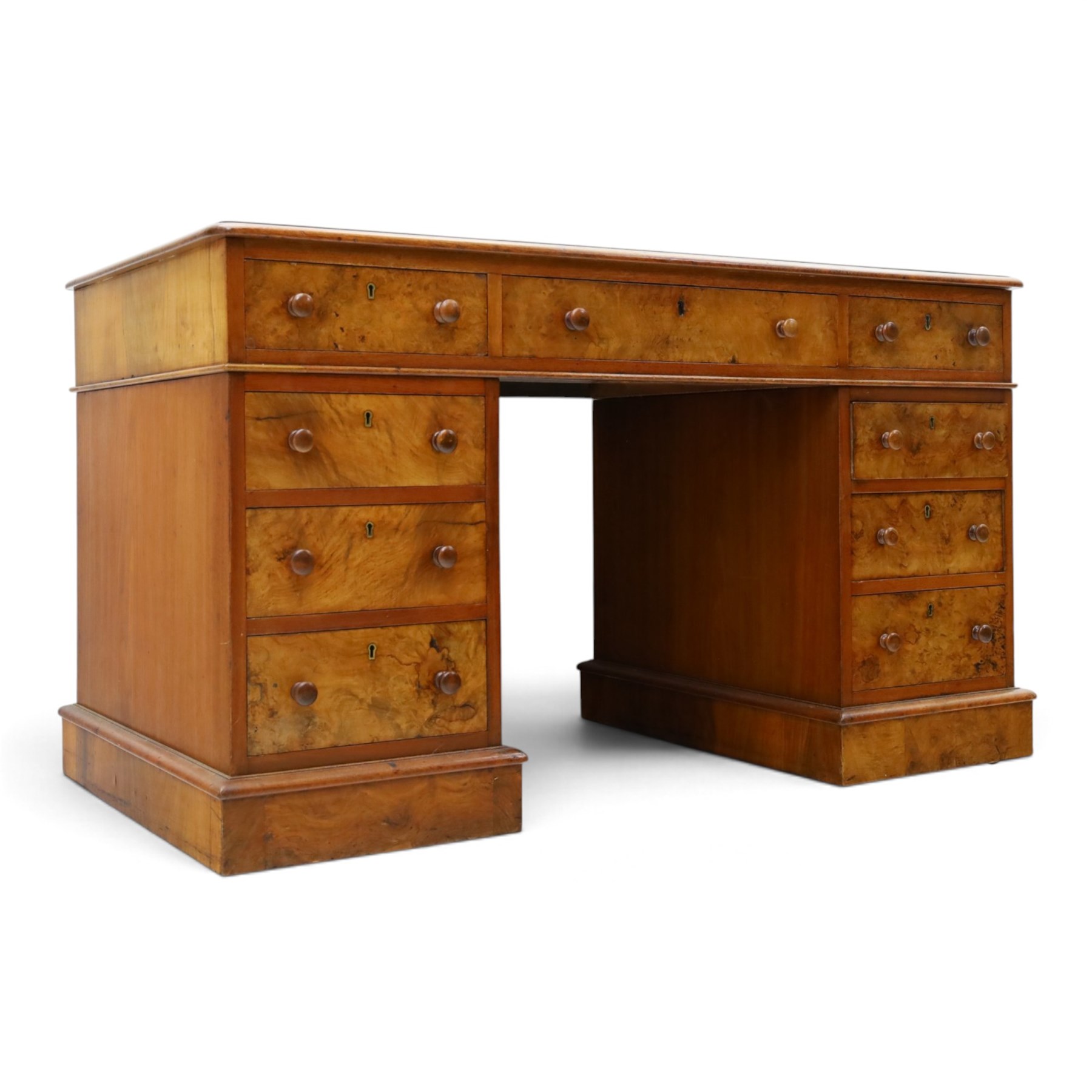 19th century burr walnut twin pedestal desk, rectangular top inset tooled green leather insert with moulded edge, frieze with three drawers with turned wooden pulls, raised on pedestal bases, containing three graduated drawers raised on plinth bases with castors