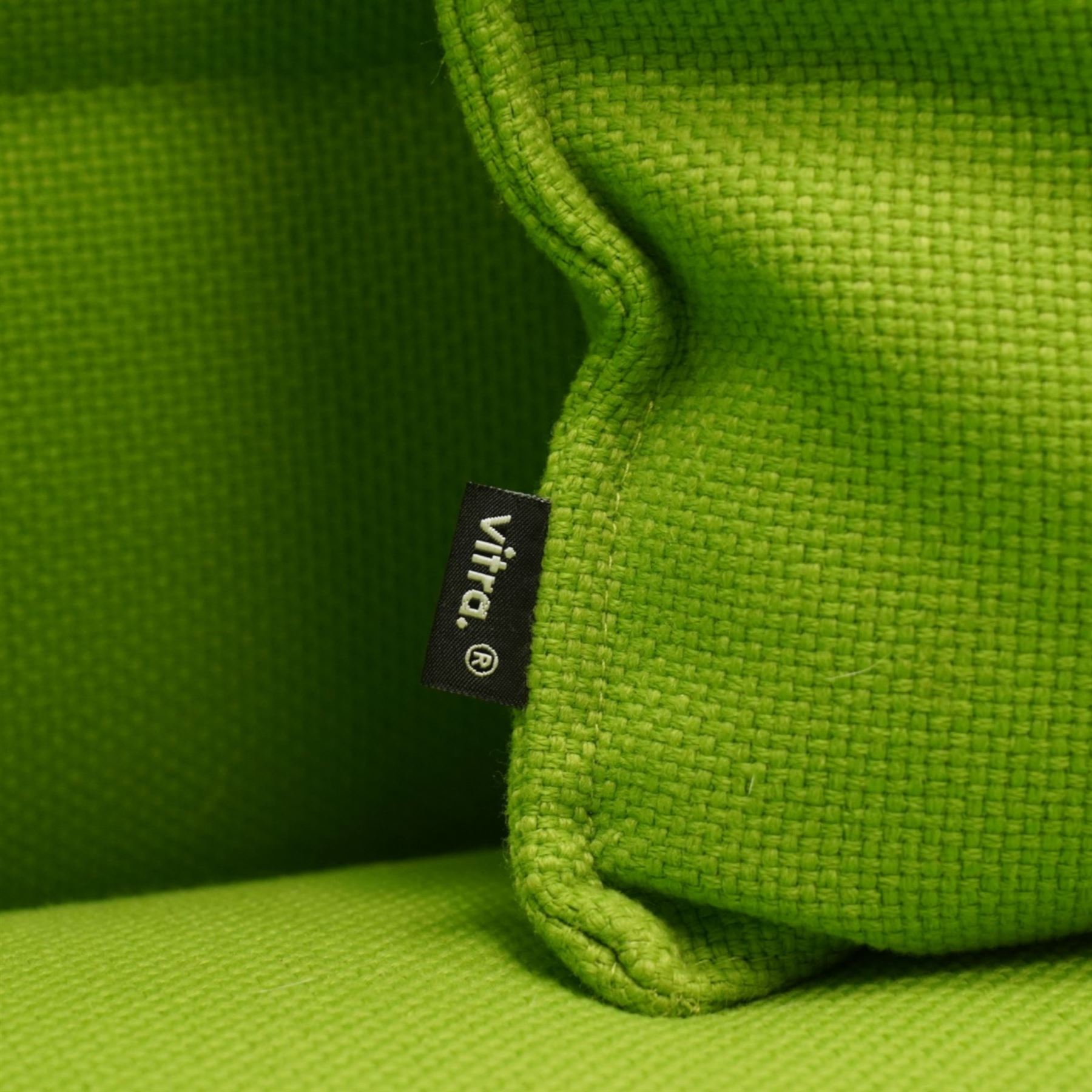 Ronan and Erwan Bouroullec (1971- ; 1976-) - Vitra ‘Alcove’ sofa, with high winged sides and back upholstered in green ‘Credo’ fabric with horizontal channel detailing, fitted seat cushion and scatter cushion, on chrome tubular frame supports