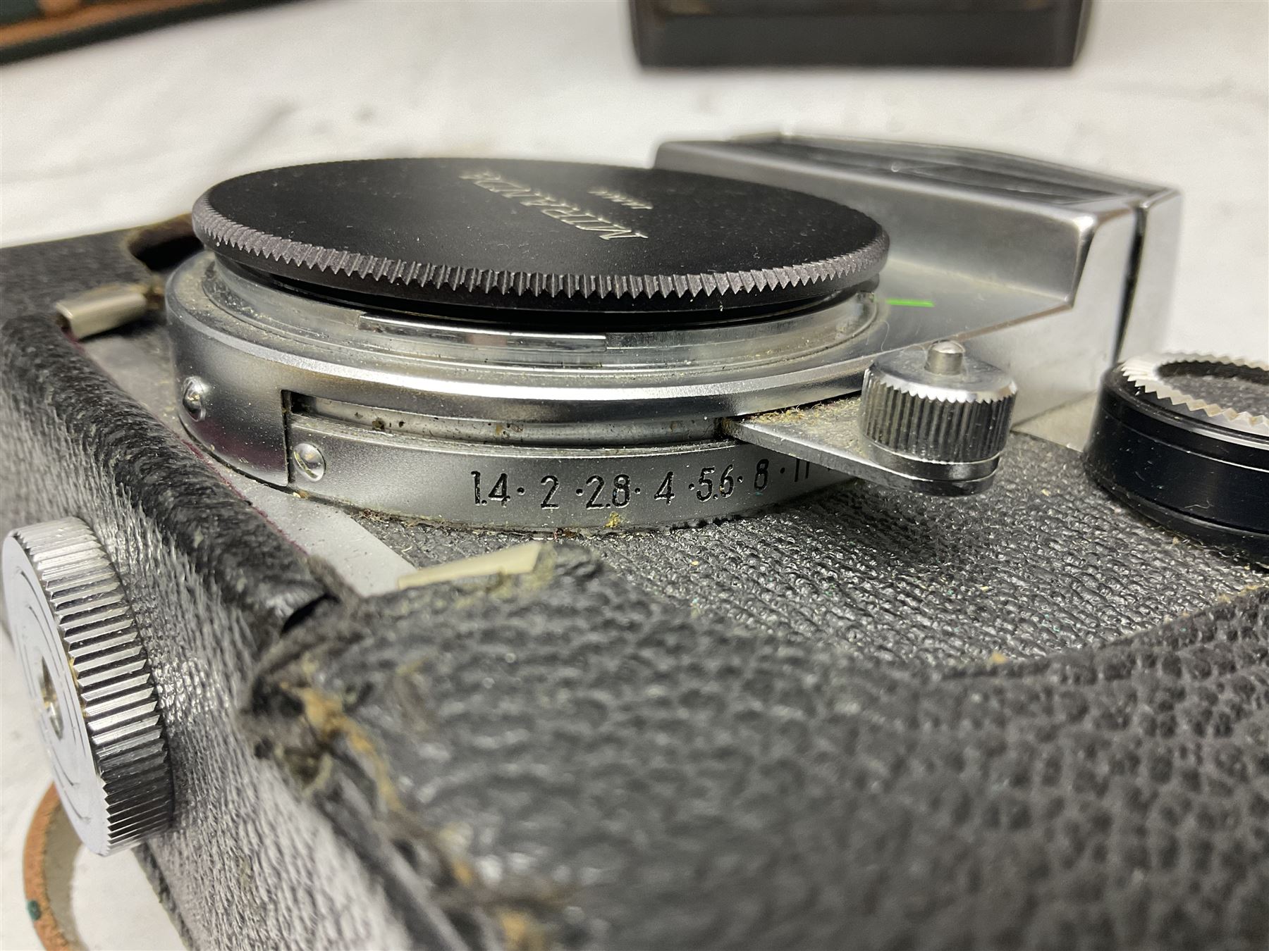 Miranda Sensorex camera body, Miranda Sensorex II camera body with 'Auto Miranda 1:1.8 f-59mm' lens, 'Auto Miranda 1:2.8 f-135mm' lens, 'Auto Miranda 1:3.5 f-200mm' lens, 'Auto Miranda 1:2.8 f-28mm' len, Agfa plate camera with 9cm x 12cm plates and other camera equipment including Miranda camera bag