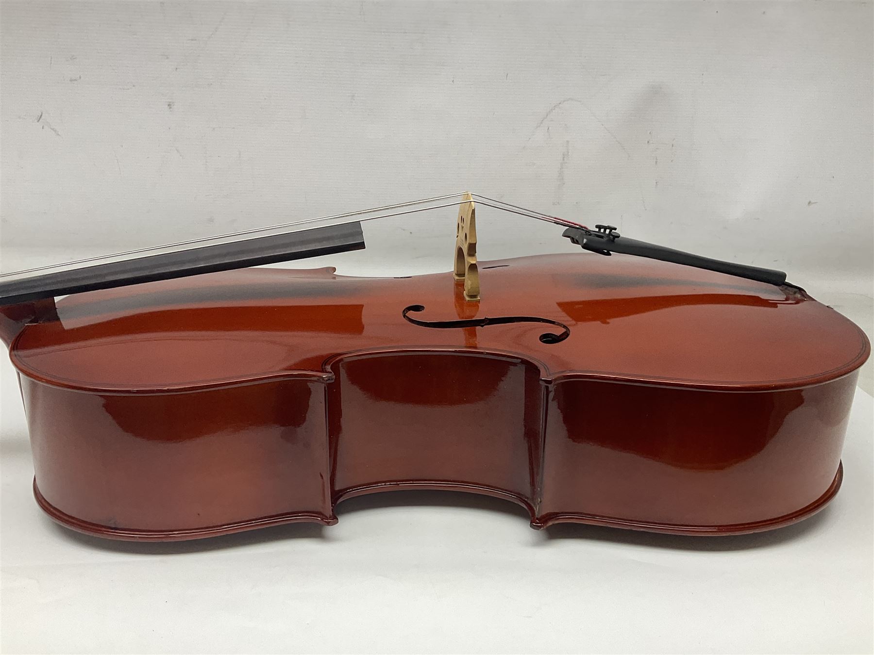 Gear4Music three-quarter sized cello with 70cm one-piece back and spruce top; bears maker's label; L112cm overall; in soft carrying case with Erich Steiner bow