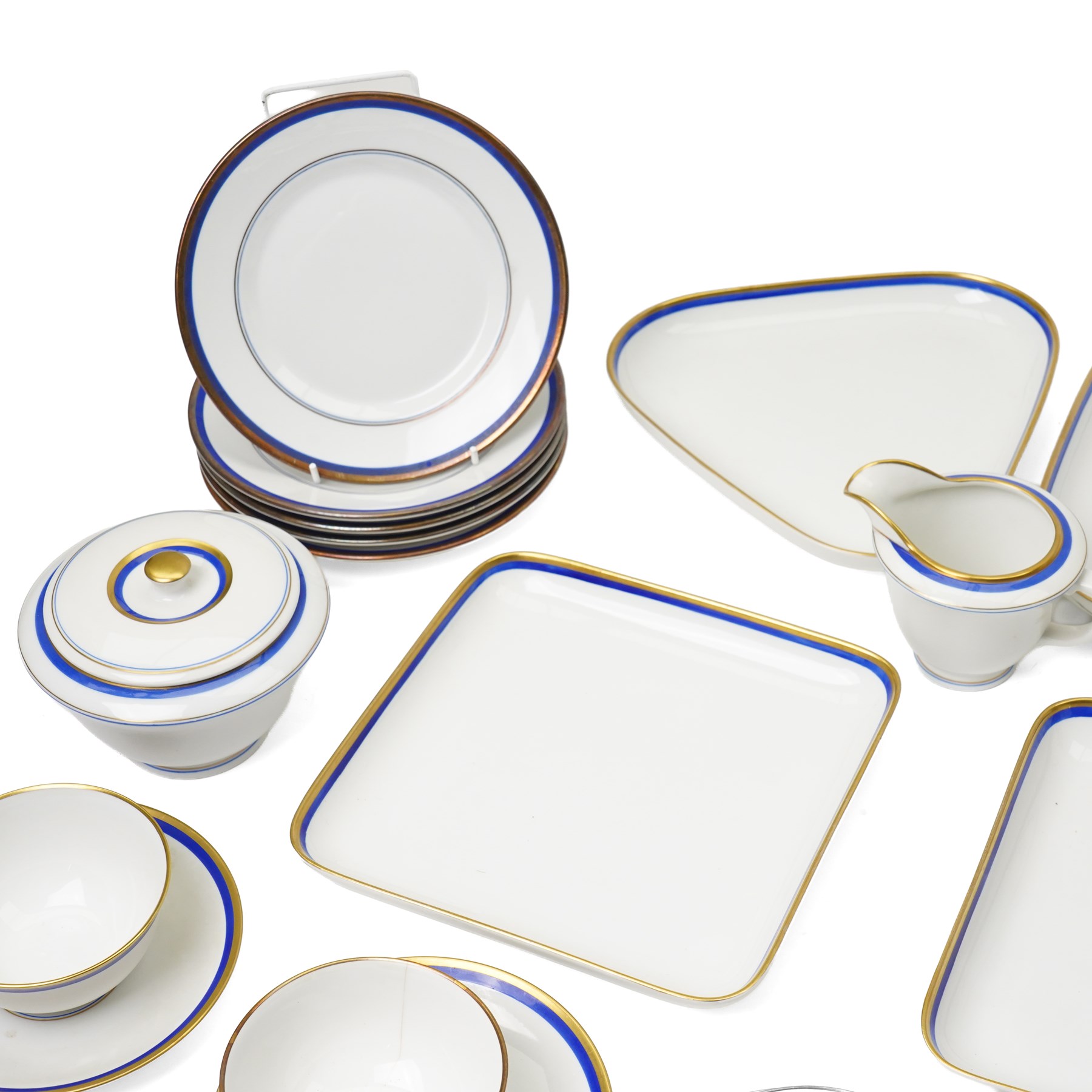 Royal Copenhagen mid-20th century tea service decorated in blue and gilt comprising ten teacups, ten saucers, ten side plates, two triangular serving plates, two square serving plates, teapot, milk jug and covered sucrier 