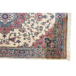 Persian design ivory ground rug with overall floral pattern (275cm x 183cm); contemporary beige ground rug decorated with stripes (175cm x 125cm)