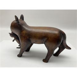 Folk Art wooden carving depicting a cat carrying a kitten, H16cm
