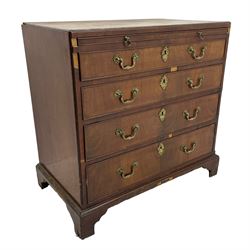 George III mahogany chest, banded caddy top with moulded edge, brushing slide over four graduating cock-beaded drawers, ornate cast gilt metal handle plates and escutcheons, swan neck handles cast with dolphins, shells and C-scrolls, lower moulding over bracket feet