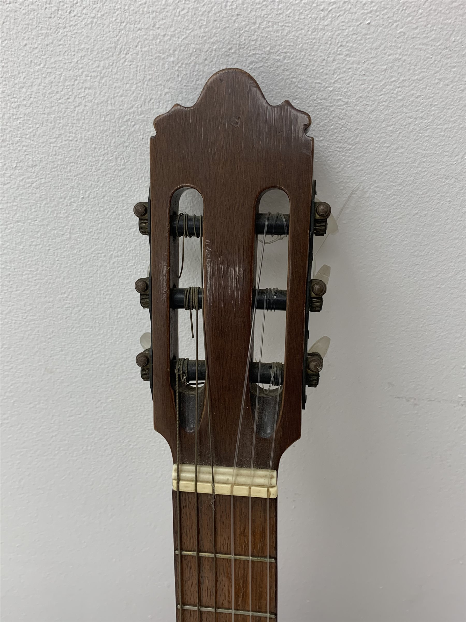 Hohner Arbor Series electric guitar in black and elm effect, serial no.E714703, L101cm; together with an acoustic guitar L102cm; with two Kinsman folding stands (4)
