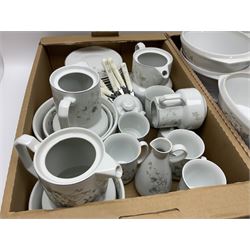 Large quantity of Porcelana Real Brasil White Blossom pattern tea and dinner wares, to include dinner plates, tea cups and saucers, salt and pepper pots, tureens, pie dishes coffee pots, place mats, spoons and glasses, etc, in five boxes 