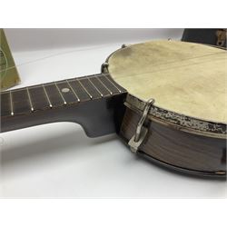 George Formby banjolele with metal plaque to headstock L55cm; in carrying case with instruction booklet.