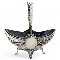 German standard 800 silver oval centrepiece with pierced sides, trailing harebells and swing handle, blue glass liner on splay feet L29cm Maker Wilhelm Binder