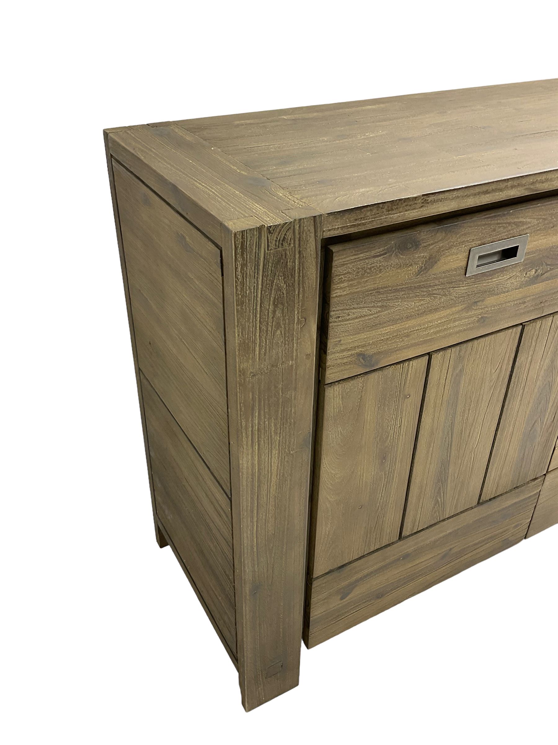 Contemporary hardwood sideboard, fitted with four drawers flanked by two cupboards, each with recessed metal handles
