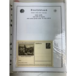 Third Reich view cards, with used and unused examples, some with handwritten text, housed in two ring binder folders