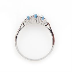 9ct white gold emerald cut three stone blue topaz ring, hallmarked