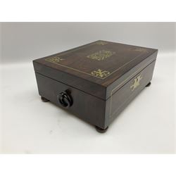 Victorian rosewood sewing box, of rectangular form with twin ring carry handles, brass escutcheon and inlaid brass scrolling decoration to the hinged cover, opening to reveal a lined and fitted interior, upon four compressed bun feet, H11cm W28cm D20.5cm