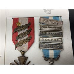 French Republic Colonial Medal with five clasps for Libye, Afrique Francaise Libre, Bir Hakeim, Koufra and Tchad; and Croix de Guerre Des Theatres D'Operations Exterieurs with three MID leaves and gold star; both with ribbons (2)