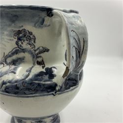 Tin glazed earthenware wet drug jug, decorated with cherubs in a landscape, H90cm 