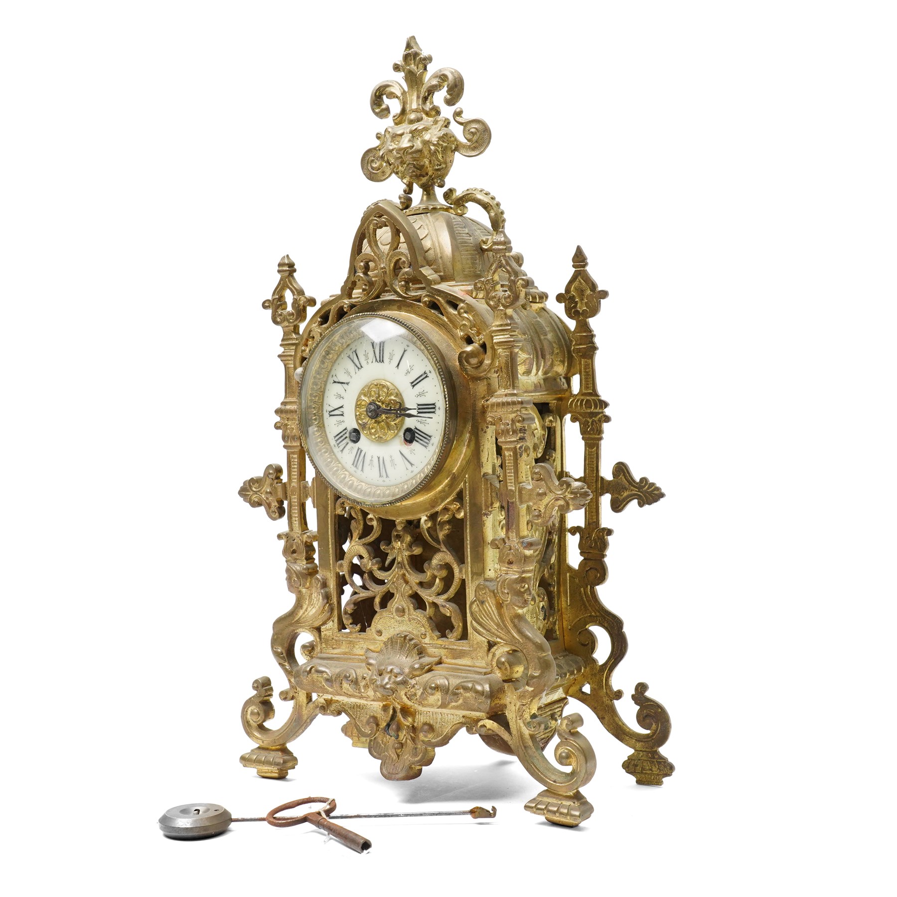 Early 20th century brass mantle clock with white dial and bell strike H42cm
