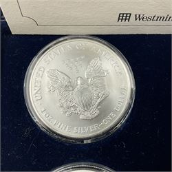 Four one ounce fine silver coins, forming 'The 2003 Famous World Silver Coin Collection', comprising United States eagle, Australian kangaroo, Chinese panda and Canadian maple leaf, cased with Westminster certificate 