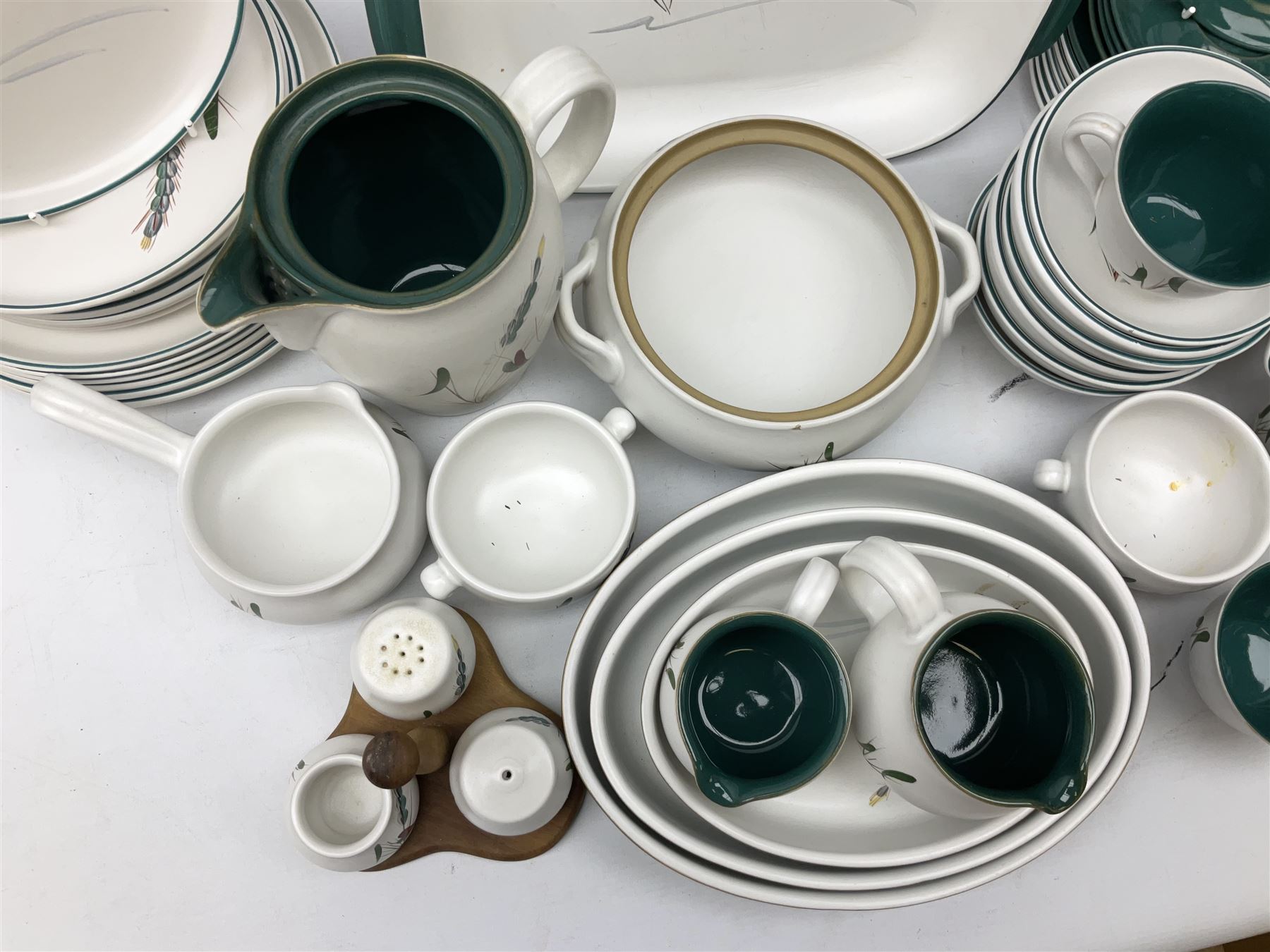 Denby Greenwheat pattern part dinner and tea service, to include six dinner plates, six side plates, six dessert plates, six bowls, four serving dishes of various sizes, teapot, two milk jugs etc (47)